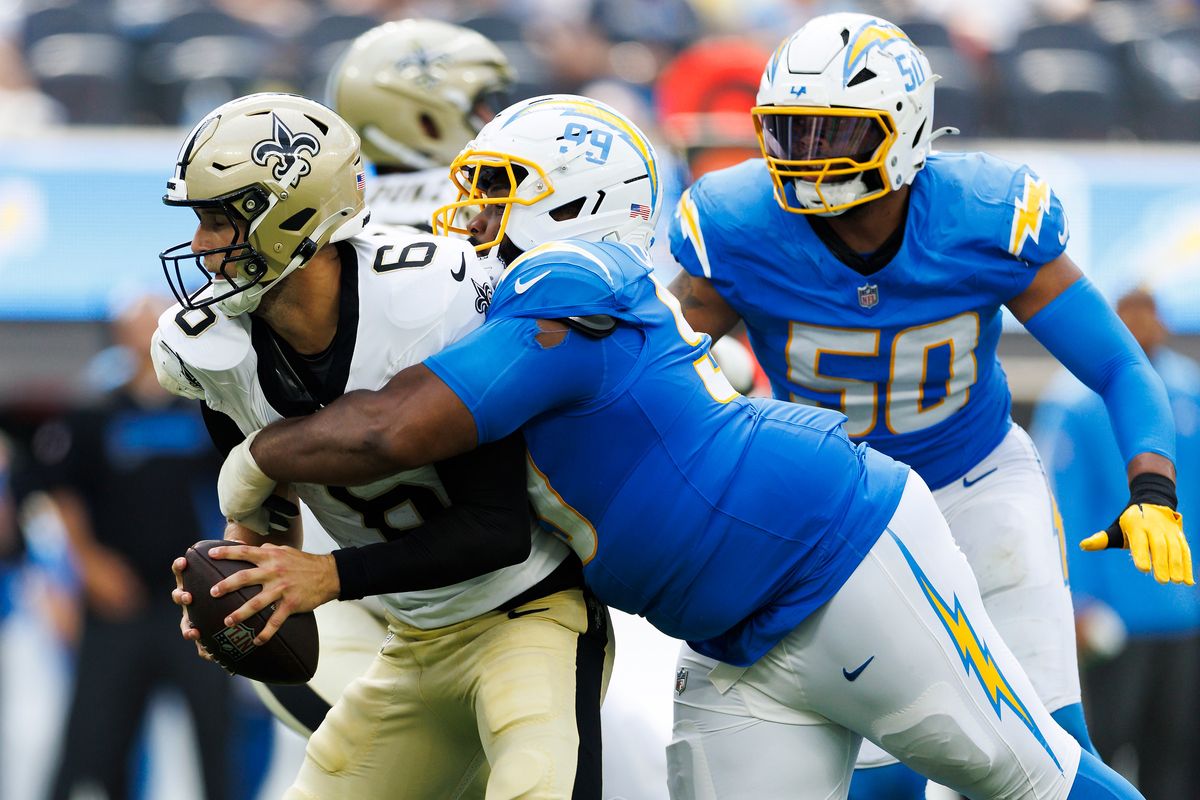 Jamaree Caldwell #99 of the Los Angeles Chargers sacks during the second half against the New Orleans Saints at SoFi Stadium on August 10, 2025 in Inglewood, California. Jamaree Caldwell #99 of the Los Angeles Chargers sacks during the second half against the New Orleans Saints at SoFi Stadium on August 10, 2025 in Inglewood, California.