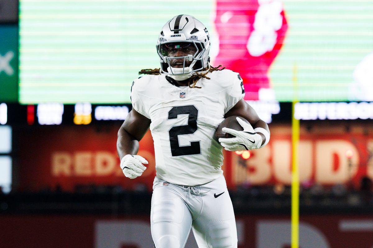 Ashton Jeanty #2 of the Las Vegas Raiders runs with the ball before the game against the Arizona Cardinals at State Farm Stadium on August 23, 2025 in Glendale, Arizona. 