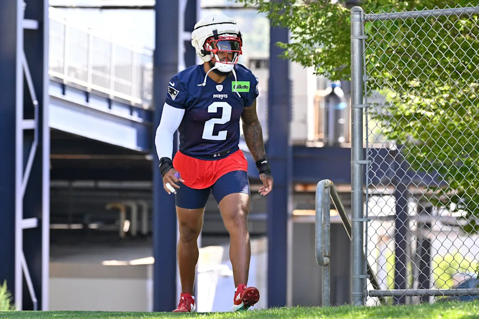 Jul 23, 2025; Foxborough, MA, USA; New England Patriots linebacker Harold Landry III (2) walks to the practice fields for training camp at Gillette Stadium. Mandatory Credit: Eric Canha-Imagn Images
