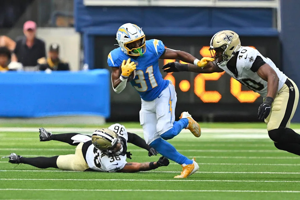 Chargers running back Nyheim Miller-Hines carries the ball against the Saints on Sunday.
