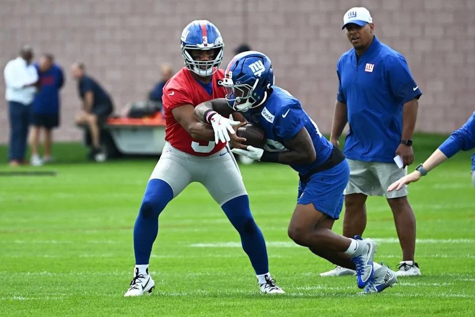 Russell Wilson (3) hands the ball off during the Giants’ practice Aug. 24. Bill Kostroun for the NY Post