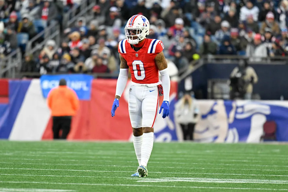 Dec 1, 2024; Foxborough, Massachusetts, USA; New England Patriots cornerback Christian Gonzalez (0) lines up during the second half against the Indianapolis Colts at Gillette Stadium. Mandatory Credit: Eric Canha-Imagn Images