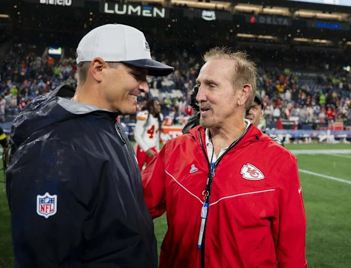 Seattle Seahawks head coach Mike Macdonald and Kansas City Chiefs defensive coordinator Steve Spagnuolo talk after the Seattle Seahawks 33-16 victory in the preseason game at Lumen Field, on Friday, Aug. 15, 2025, in Seattle.