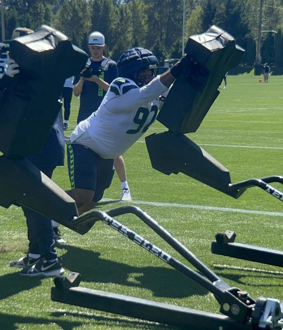 Defensive tackle Quinton Bohanna on the blocking sled at Seattle Seahawks NFL training camp Aug. 12, 2025, at the Virginia Mason Athletic Center in Renton.