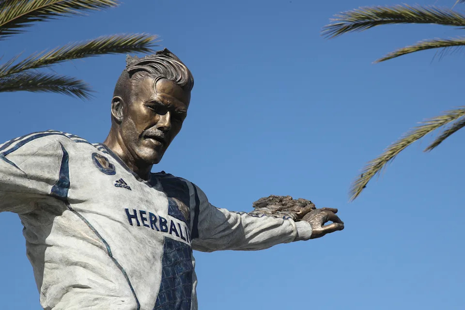 David Beckham's impact on MLS and the Los Angeles Galaxy earned him a statue outside of the team's stadium. (Photo by Matthew Ashton - AMA/Getty Images)