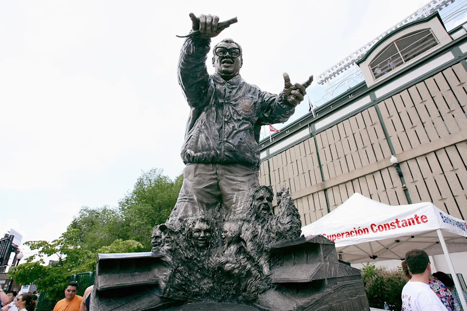 The statue of legendary Cubs broadcaster Harry Caray stands outside of Wrigley Field in Chicago. (Photo by Ron Vesely/MLB via Getty Images)