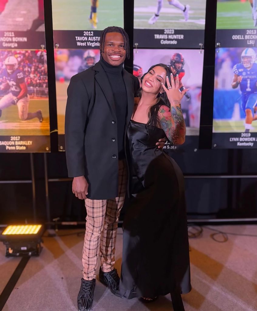 travis hunter and wife leanna lenee flasing engagement ring