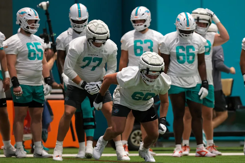 Jul 23, 2025; Miami Gardens, FL, USA; Miami Dolphins center Andrew Meyer (60) works during training camp at Baptist Health Training Complex. Mandatory Credit: Sam Navarro-Imagn Images