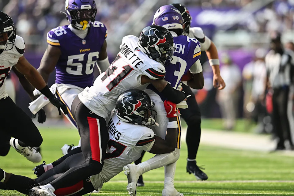 Aug 9, 2025; Minneapolis, Minnesota, USA; Houston Texans cornerback Myles Bryant (27) and cornerback Damon Arnette (41) tackle Minnesota Vikings wide receiver Silas Bolden (83) during the fourth quarter at U.S. Bank Stadium. Mandatory Credit: Jeffrey Becker-Imagn Images