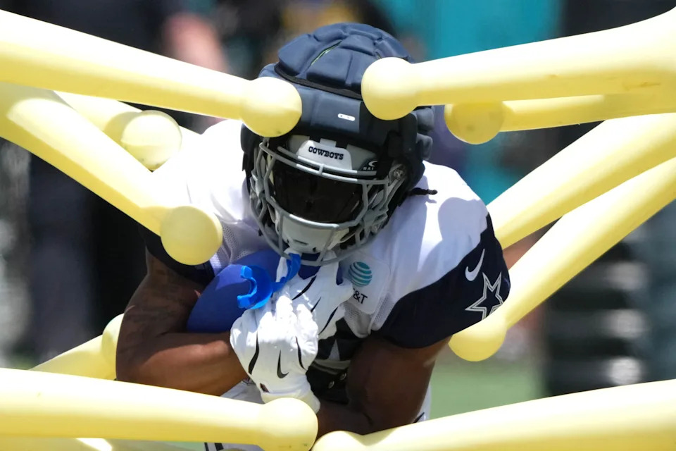 Jul 27, 2025; Oxnard, CA, USA; Dallas Cowboys running back Jaydon Blue (34) carries the ball at training camp at the River Ridge Fields. Mandatory Credit: Kirby Lee-Imagn Images