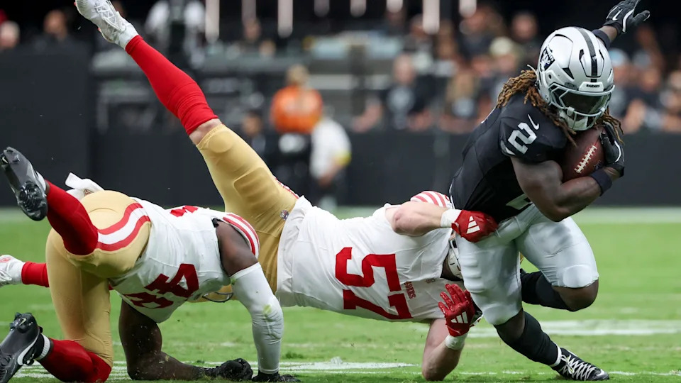 Las Vegas Raiders running back Ashton Jeanty gets tackled by the San Francisco 49ers
