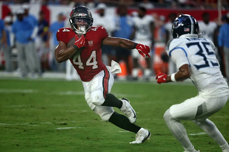 Aug 9, 2025; Tampa, Florida, USA; Tampa Bay Buccaneers running back Sean Tucker (44) runs with the ball against the Tennessee Titans during the first half at Raymond James Stadium. Mandatory Credit: Kim Klement Neitzel-Imagn Images