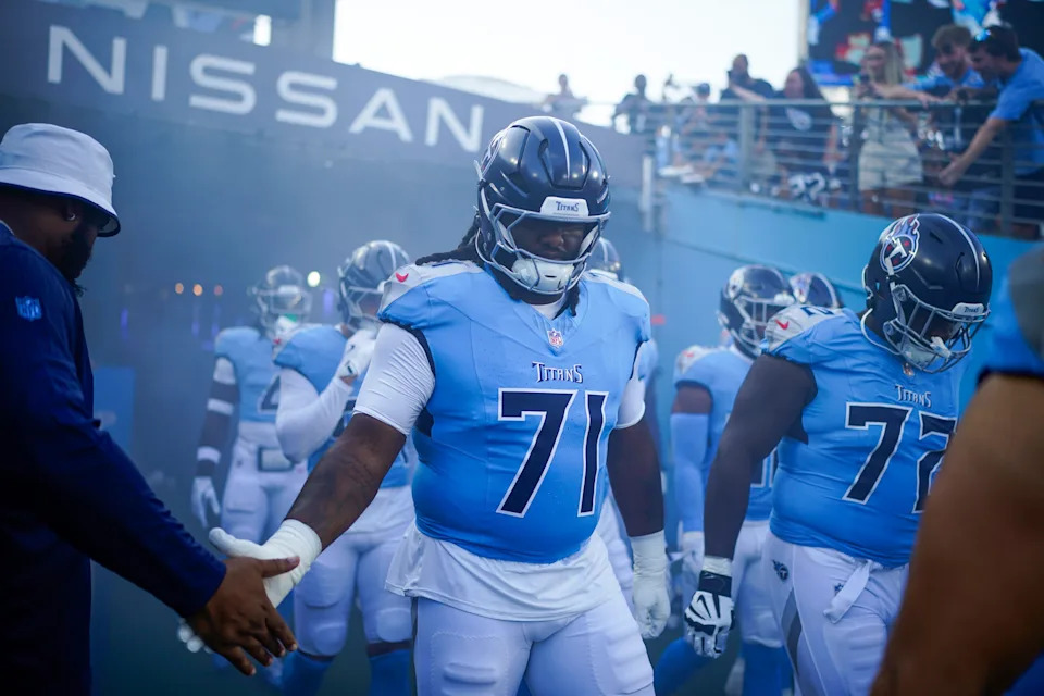 Tennessee Titans offensive tackle Jaelyn Duncan (71) heads out for warmups before an NFL pre-season game against the Minnesota Vikings at Nissan Stadium in Nashville, Tenn., Friday, Aug. 22, 2025.
