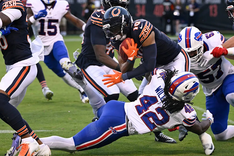 Aug 17, 2025; Chicago, Illinois, USA; Chicago Bears wide receiver Tyler Scott (10) runs against Buffalo Bills linebacker Dorian Williams (42) during the first half at Soldier Field. Mandatory Credit: Matt Marton-Imagn Images