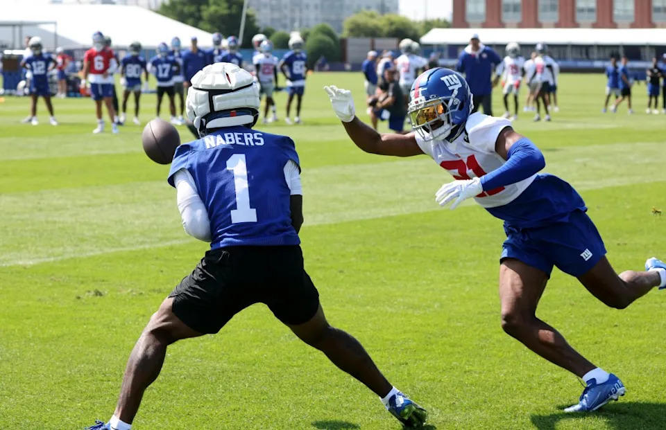 Giants wide receiver Malik Nabers guarded by Paulson Adebo during practice. Charles Wenzelberg / New York Post