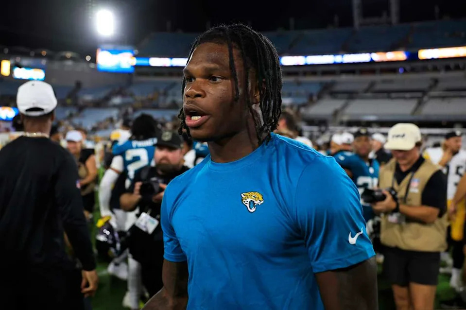 Jacksonville Jaguars wide receiver Travis Hunter (12) walks on the field to greet players after the game of an NFL preseason matchup at EverBank Stadium, Saturday, Aug. 9, 2025 in Jacksonville, Fla. The Steelers defeated the Jaguars 31-25. [Corey Perrine/Florida Times-Union]© Corey Perrine&sol;Florida Times-Union &sol; USA TODAY NETWORK via Imagn Images