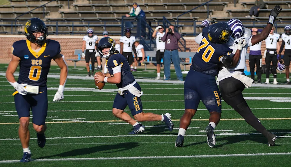 UCO #2 QB Jett Huff rolls out at the NCAA Div II playoff game between Ouachita Baptist University (OBU) Tigers and the University of Central Oklahoma (UCO) Bronchos at Chad Richison Stadium in Edmond, Oklahoma, Saturday, Nov. 23, 2024.
