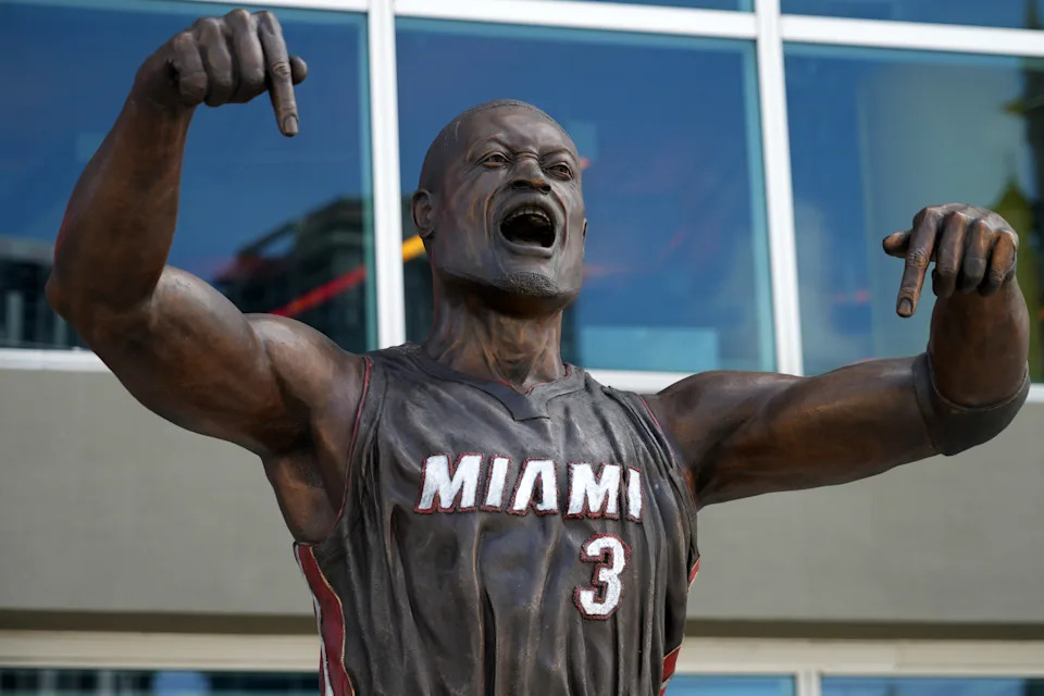 A statue of former Miami Heat guard Dwyane Wade was unveiled outside the Kaseya Center in 2024. (Photo by Kirby Lee/Getty Images)