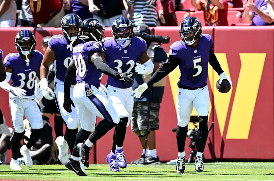 LANDOVER, MARYLAND - AUGUST 23: Jalyn Armour-Davis #5 of the Baltimore Ravens celebrates with teammates after intercepting a pass in the second quarter of the NFL Preseason 2025 game against the Washington Commanders (Photo by Greg Fiume/Getty Images)