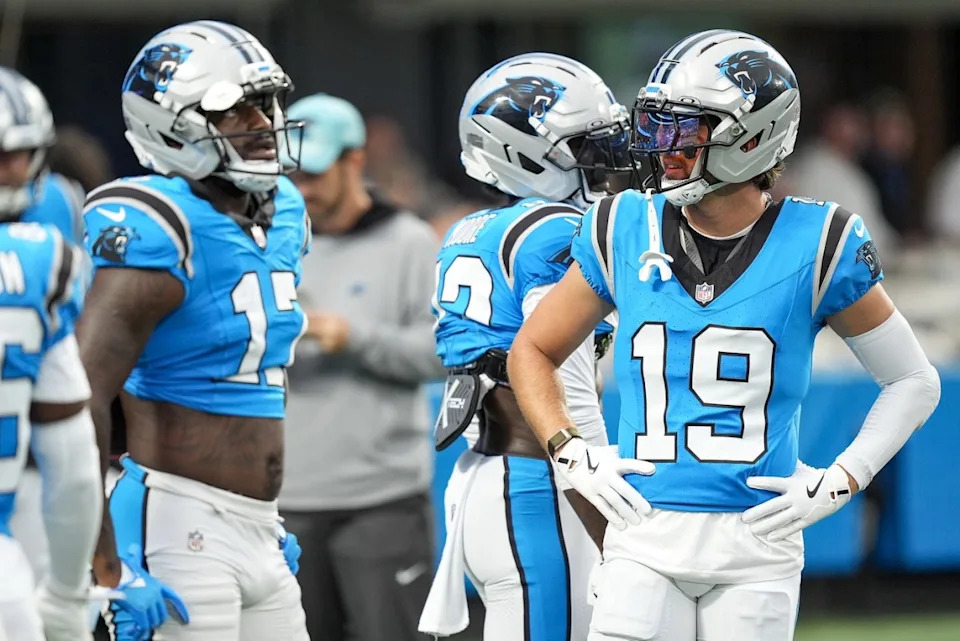Aug 2, 2025; Charlottle, NC, USA; Carolina Panthers wide receiver Xavier Legette (17) chats with wide receiver Adam Thielen (19) during Fanfest at Bank of America Stadium. Jim Dedmon-Imagn Images