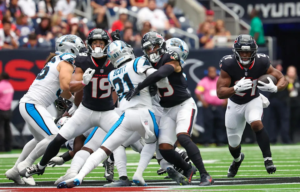 Aug 16, 2025; Houston, Texas, USA; Houston Texans running back Nick Chubb (21) rushes for five yards against the Houston Texans in the first quarter at NRG Stadium. Mandatory Credit: Thomas Shea-Imagn Images