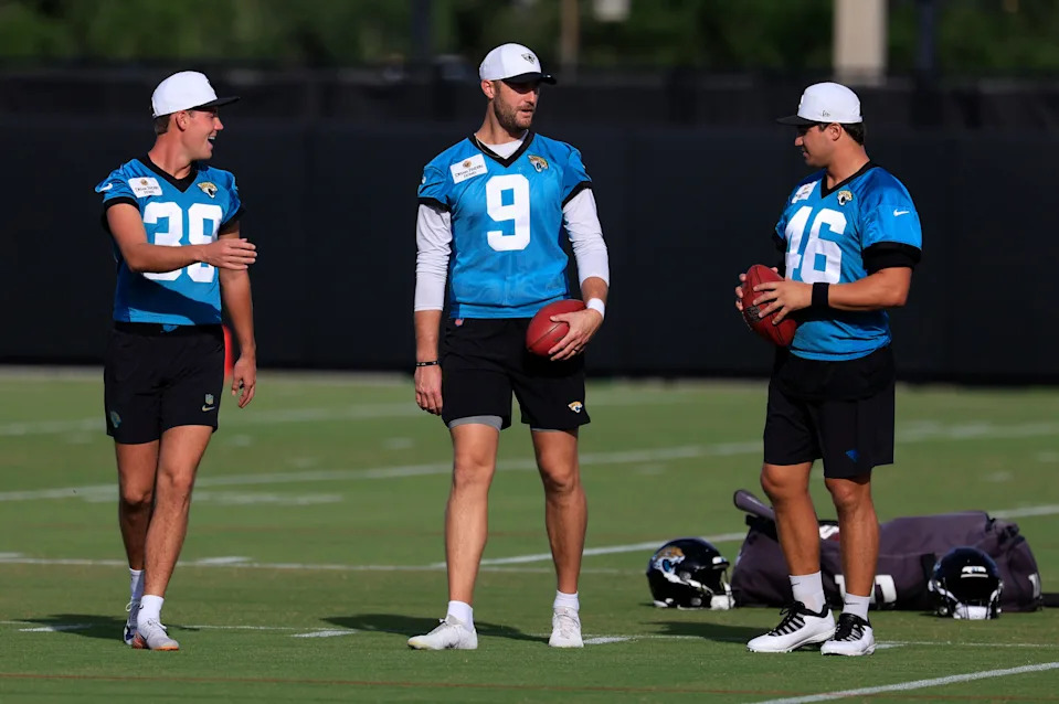 Jacksonville Jaguars place kicker Cam Little (39), punter Logan Cooke (9) and long snapper Ross Matiscik (46) talk during an NFL training camp session at the Miller Electric Center, Monday, Aug. 11, 2025 in Jacksonville, Fla. [Corey Perrine/Florida Times-Union]