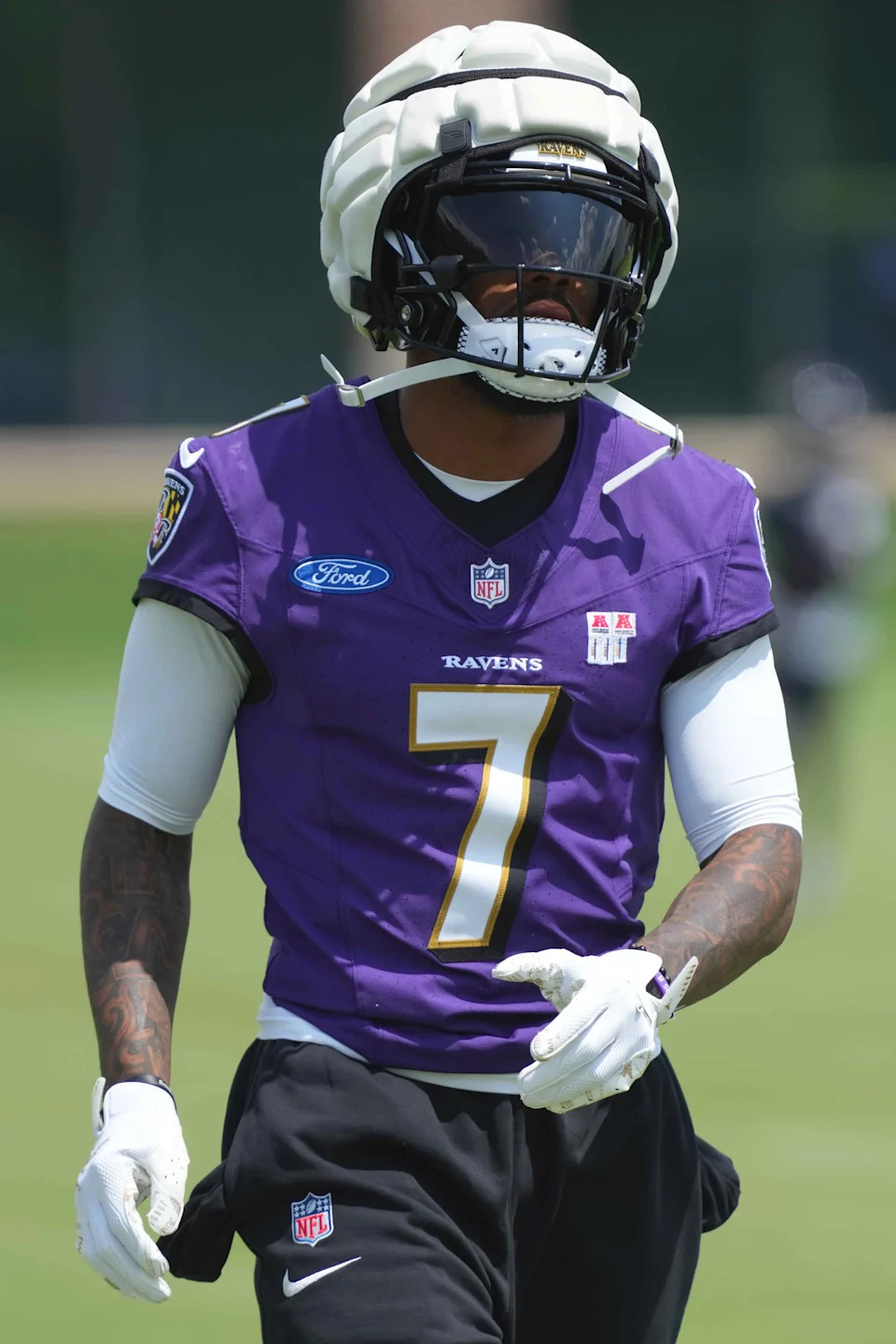 Jul 23, 2025; Owings Mills, MD, USA; Baltimore Ravens wide receiver Rashod Bateman (7) warms up during training camp at Under Armour Performance Center. Mandatory Credit: Mitch Stringer-Imagn Images