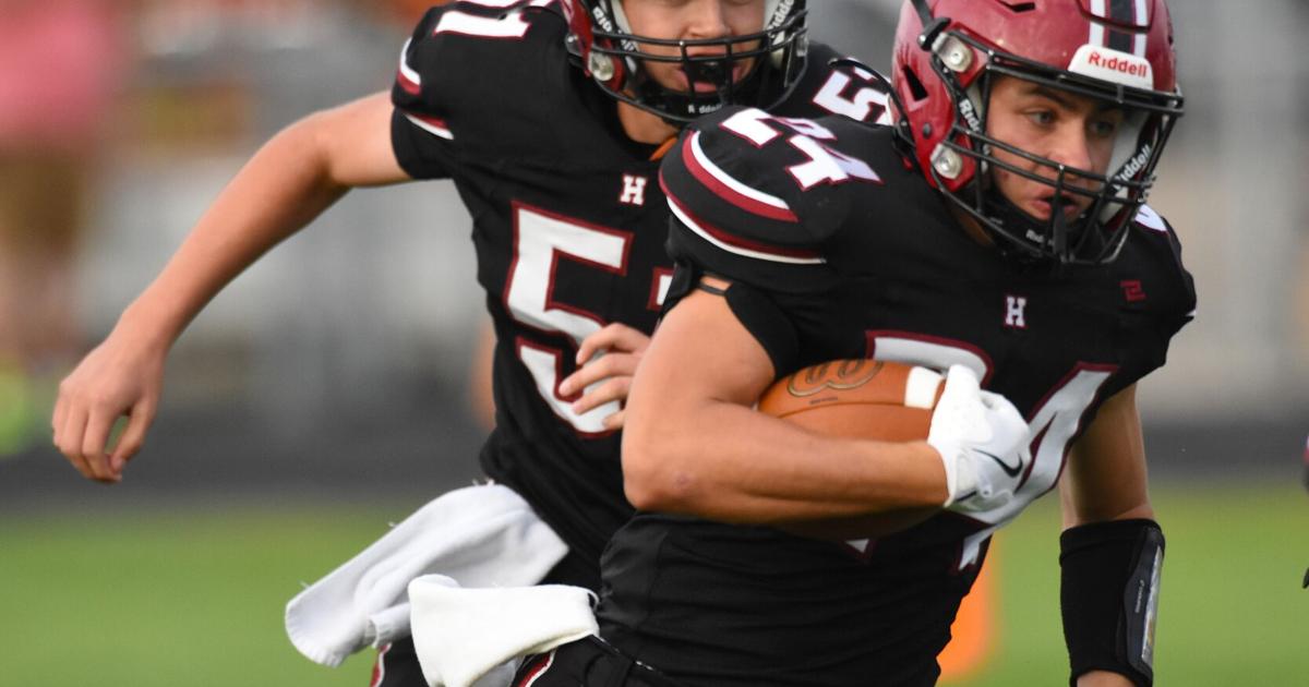 Huskies drop gridiron opener against Titans