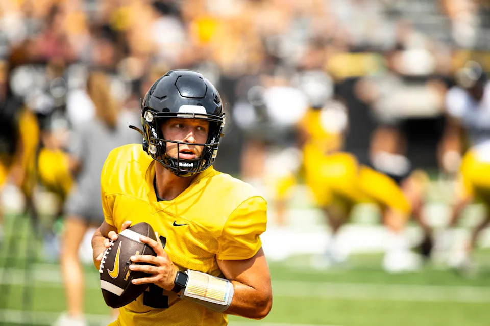 Aug 9, 2025; Iowa quarterback Mark Gronowski (11) warms up during the Hawkeyes Kids Day NCAA football open practice at Kinnick Stadium in Iowa City, Iowa. Mandatory Credit: Joseph Cress for the Des Moines Register