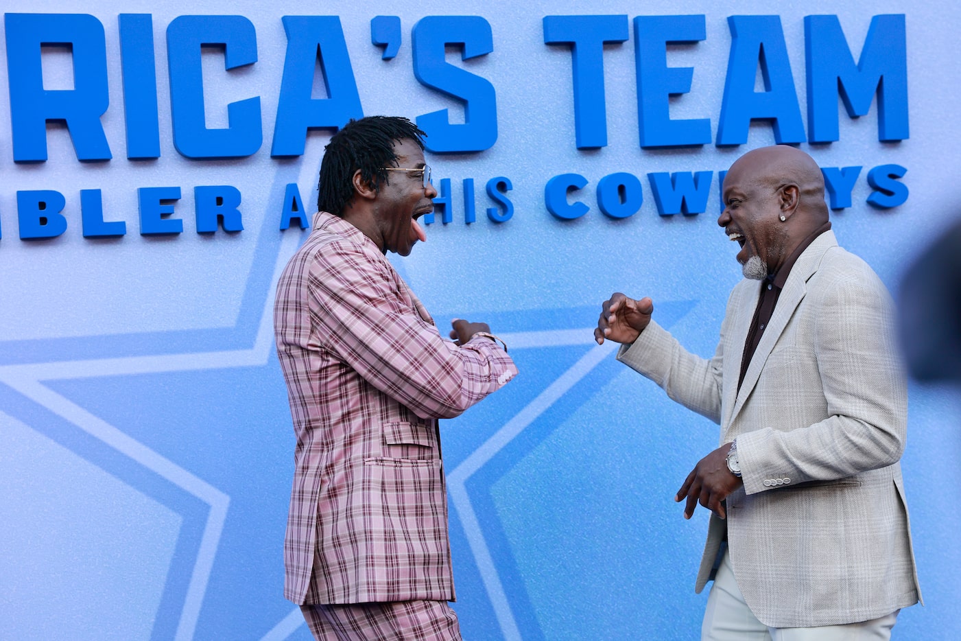 Former Dallas Cowboys Pro Football Hall of Famers Michael Irvin (left) and Emmitt Smith...