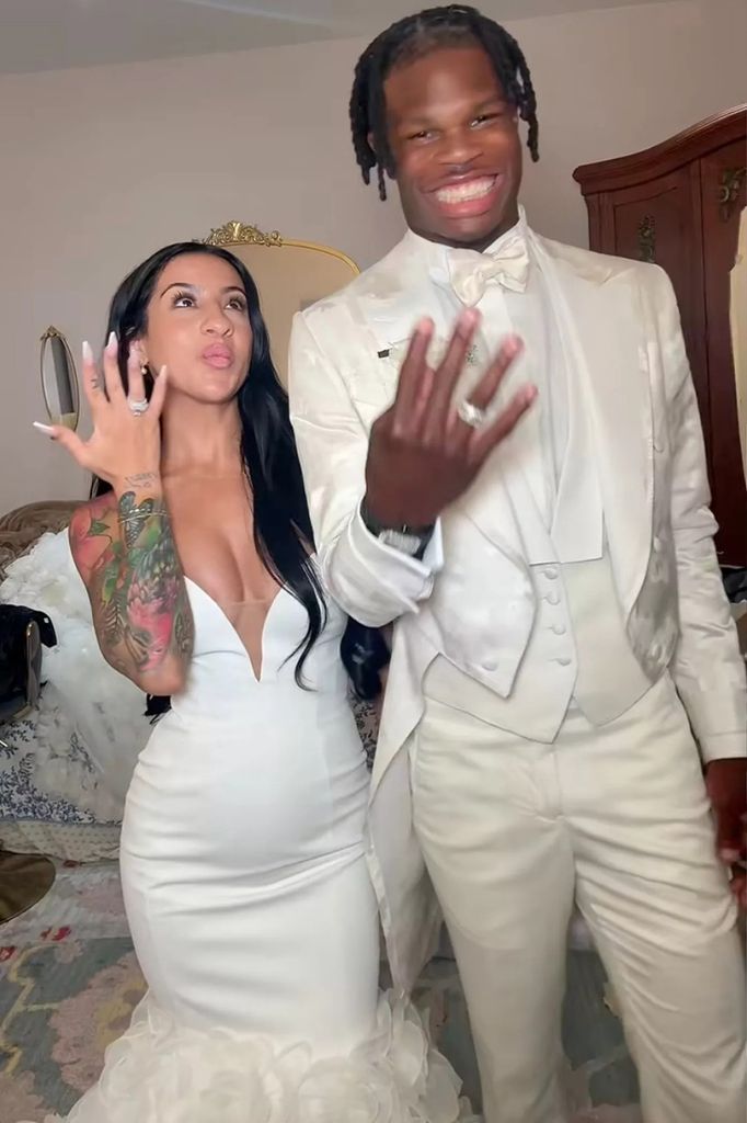 travis hunter and leanna lenee on wedding day