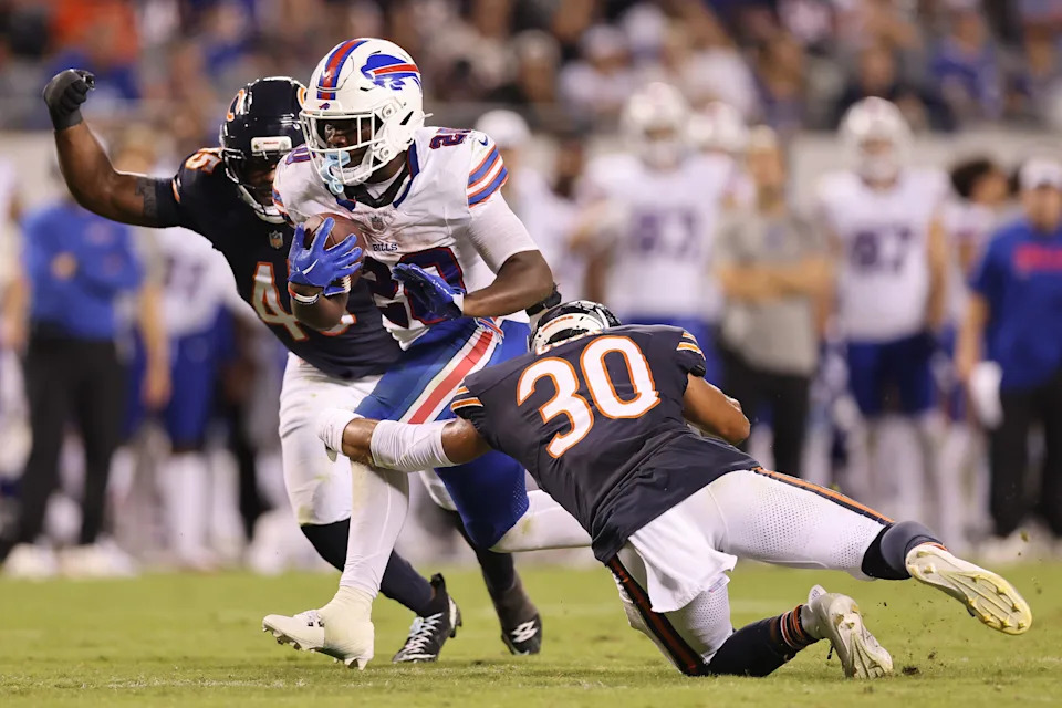 CHICAGO, ILLINOIS - AUGUST 17: Frank Gore Jr. #20 of the Buffalo Bills breaks a tackle against the Chicago Bears during the NFL Preseason 2025 game between Buffalo Bills and Chicago Bears at Soldier Field on August 17, 2025 in Chicago, Illinois. (Photo by Michael Reaves/Getty Images)