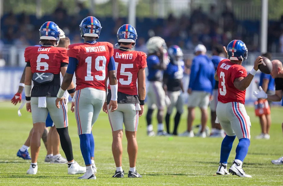 New York Giants quarterbacks Jaxson Dart (6), quarterback Jameis Winston (19), quarterback Tommy DeVito (15) and Russell Wilson (3) during a joint training camp practice with the New York Jets, Wednesday, August 13, 2025, in East Rutherford, N.J.