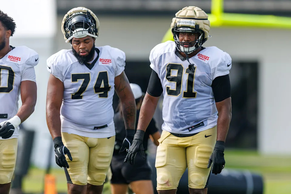 Jul 30, 2025; New Orleans, LA, USA; New Orleans Saints defensive tackle Vernon Broughton (91) and defensive end Omari Thomas (74) during training camp at Ochsner Sports Performance Center. Mandatory Credit: Stephen Lew-Imagn Images