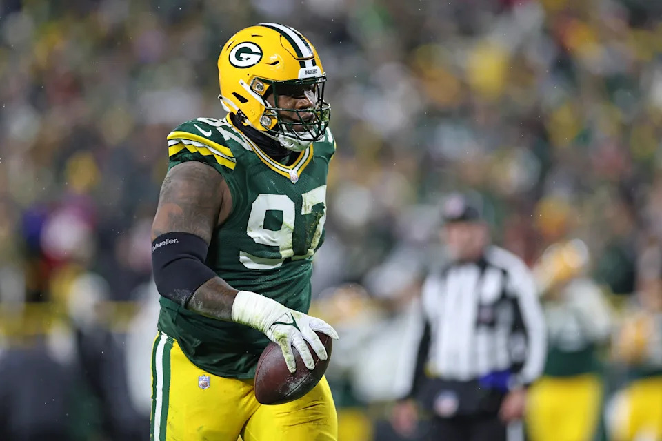 GREEN BAY, WISCONSIN - NOVEMBER 24: Kenny Clark #97 of the Green Bay Packers celebrates a turnover during a game against the San Francisco 49ers at Lambeau Field on November 24, 2024 in Green Bay, Wisconsin. The Packers defeated the 49'ers 38-10. (Photo by Stacy Revere/Getty Images)