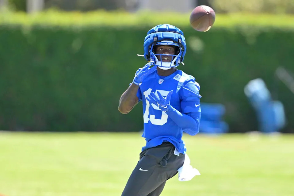Rams wide receiver Konata Mumpfield catches a pass in practice on July 26.