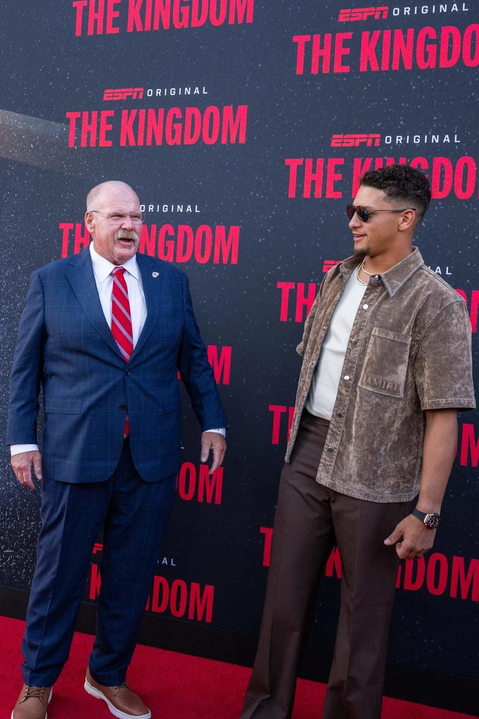 Kansas City Chiefs head coach Andy Reid and quarterback Patrick Mahomes on the red carpet before the special screening of the ESPN six-part series ‘The Kingdom,’ on Sunday, Aug. 24, 2025, in Kansas City.