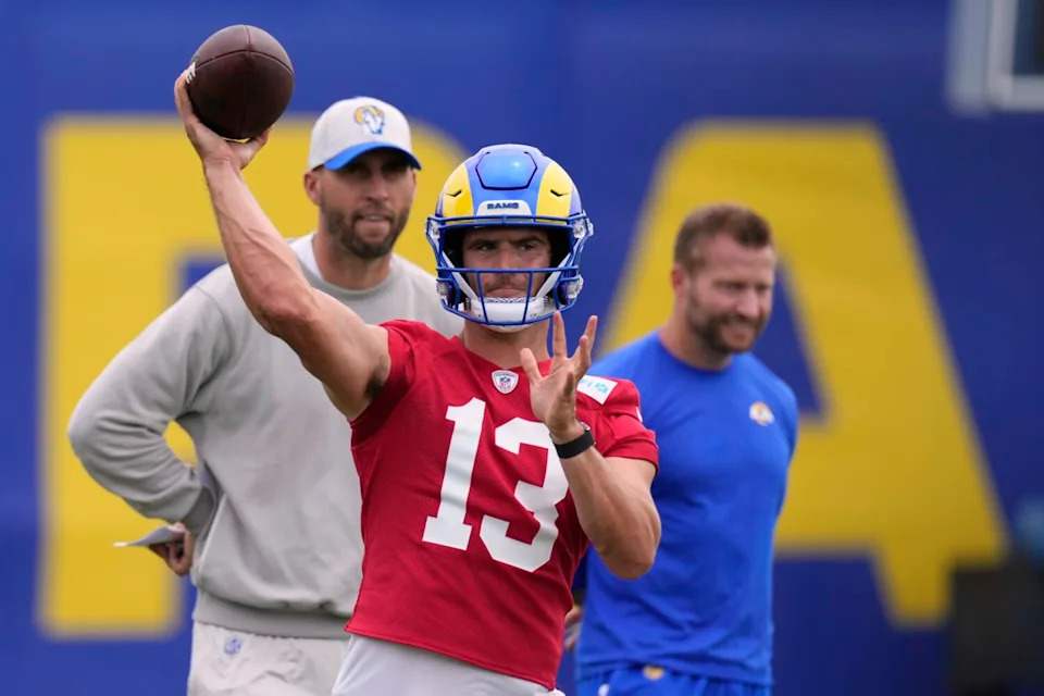 Rams quarterback Stetson Bennett passes during practice in May.
