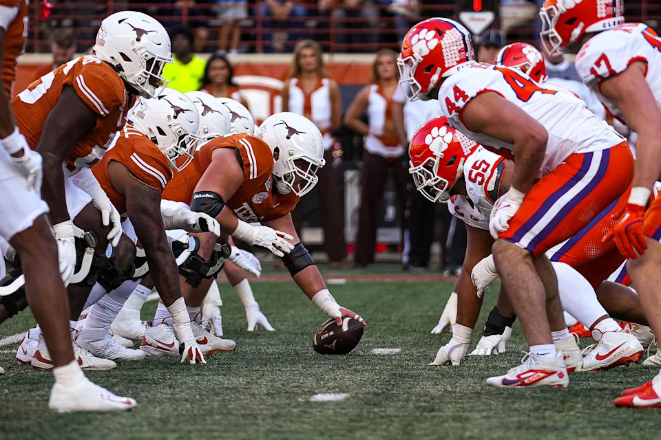 Dec 21, 2024; Austin, Texas, USA; The Texas Longhorns offense lines up for a snap against the Clemson Tigers in the first round of the College Football Playoffs at Darrell K Royal-Texas Memorial Stadium. Mandatory Credit: Aaron E. Martinez/USA Today Network via Imagn Images