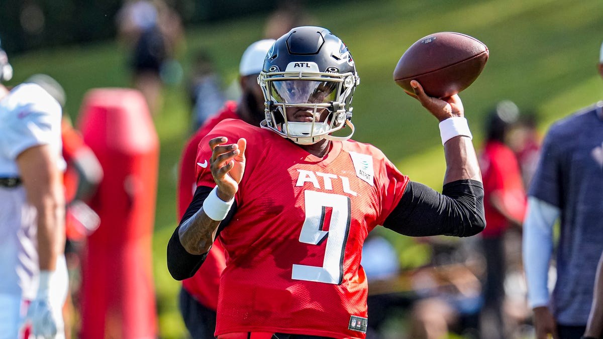 Michael Penix throw sparks fight with Titans