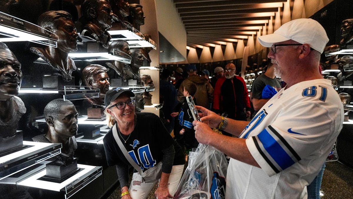 Detroit Lions fans explore the Pro Football Hall of Fame Museum