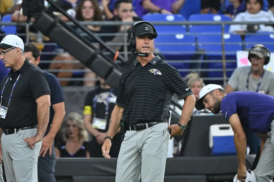 Aug 7, 2025; Baltimore, Maryland, USA; Baltimore Ravens head coach John Harbaugh looks on from the sidelines during the first quarter against the Indianapolis Colts at M&T Bank Stadium. Rafael Suanes-Imagn Images