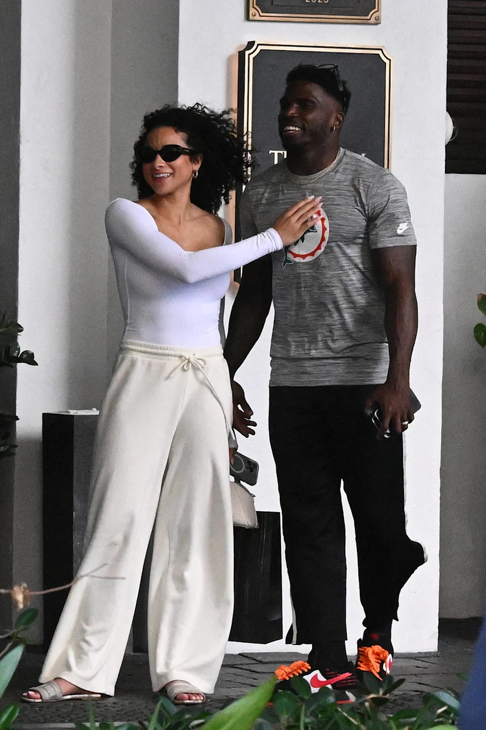 Tyreek Hill and his wife Keeta Vaccaro out for a seaside lunch. at Ocean Grill at Setai Hotel in Miami
