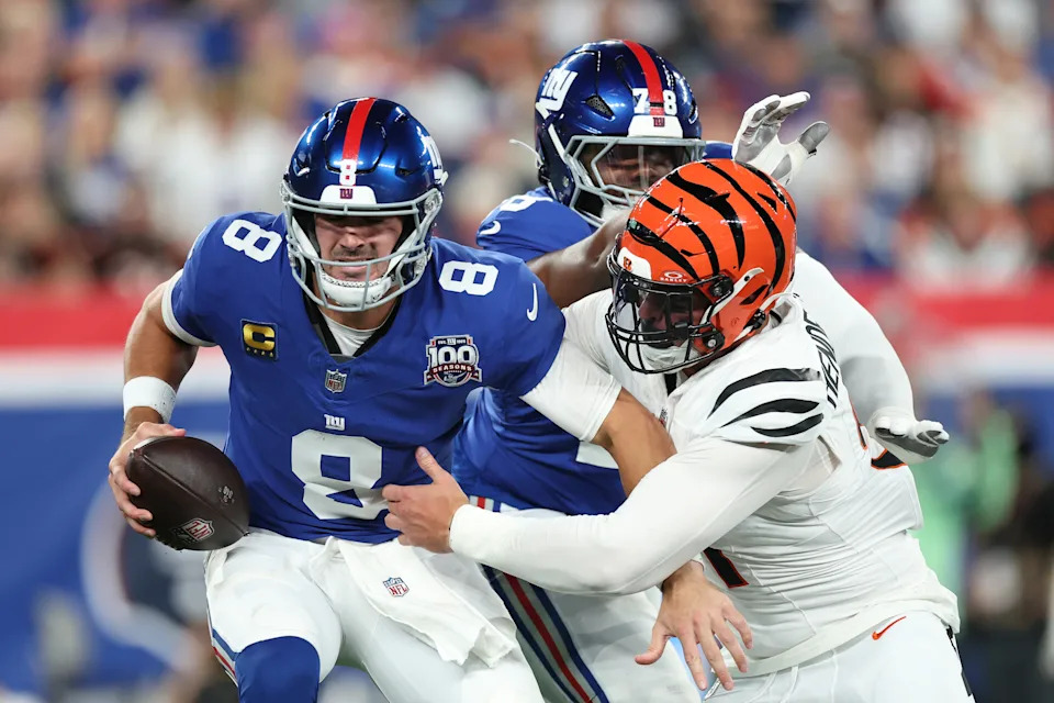 EAST RUTHERFORD, NEW JERSEY - OCTOBER 13: Trey Hendrickson #91 of the Cincinnati Bengals sacks Daniel Jones #8 of the New York Giants during the first half at MetLife Stadium on October 13, 2024 in East Rutherford, New Jersey. (Photo by Luke Hales/Getty Images)