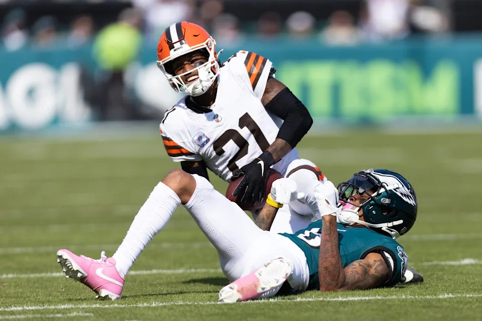 Cleveland Browns cornerback Denzel Ward (21) breaks up a pass intended for Philadelphia Eagles wide receiver DeVonta Smith on Oct. 13, 2024, in Philadelphia.