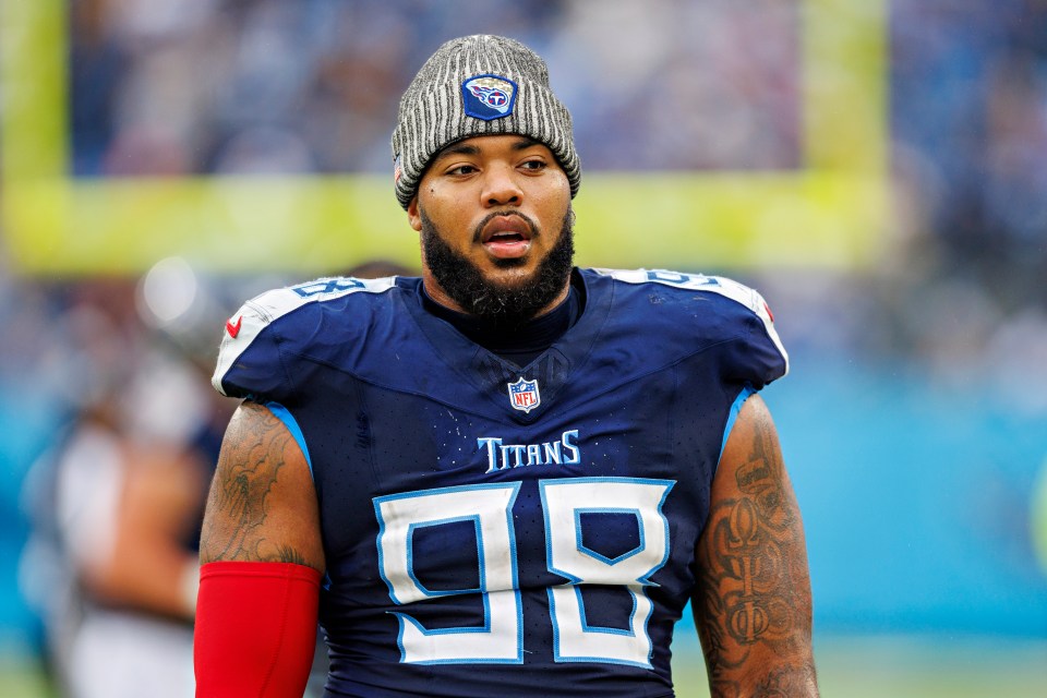 Jeffery Simmons #98 of the Tennessee Titans on the sidelines.