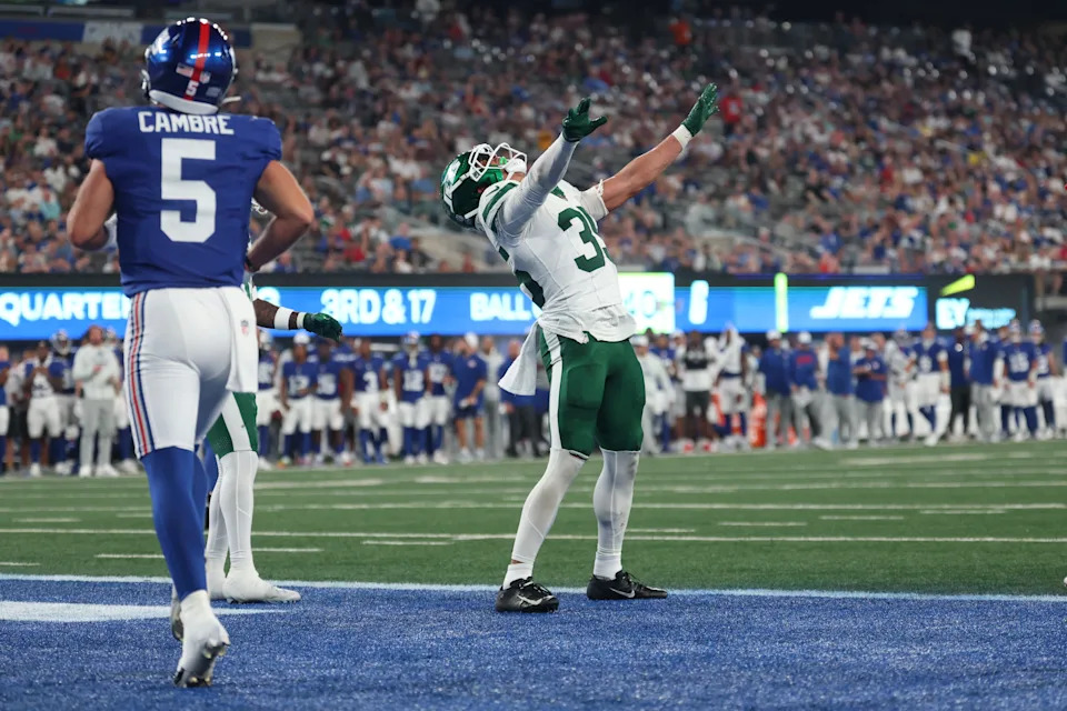 Aug 16, 2025; East Rutherford, New Jersey, USA; New York Jets safety Dean Clark (35) celebrates after breaking up a pass intended for New York Giants wide receiver Juice Wells Jr. (not pictured) during the second half at MetLife Stadium. Mandatory Credit: Vincent Carchietta-Imagn Images