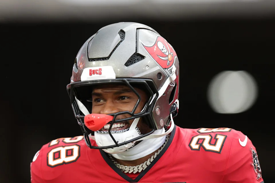 Aug 9, 2025; Tampa, Florida, USA; Tampa Bay Buccaneers safety Shilo Sanders (28) takes the field for warmups before a preseason game against the Tennessee Titans at Raymond James Stadium. Mandatory Credit: Nathan Ray Seebeck-Imagn Images