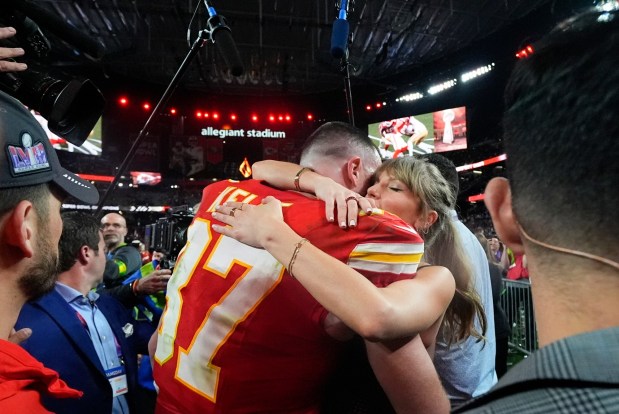 FILE - Taylor Swift embraces Kansas City Chiefs tight end Travis Kelce after the NFL Super Bowl 58 football game against the San Francisco 49ers, Feb. 11, 2024, in Las Vegas. The Chiefs won 25-22 against the 49ers. (AP Photo/Julio Cortez, File)