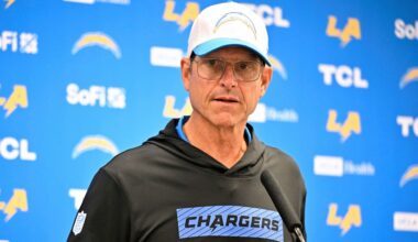 Los Angeles Chargers head coach Jim Harbaugh responds to questions during a news conference after the team's preseason NFL football game against the Dallas Cowboys, Saturday, Aug. 24, 2024, in Arlington, Texas. (AP Photo/Jerome Miron)